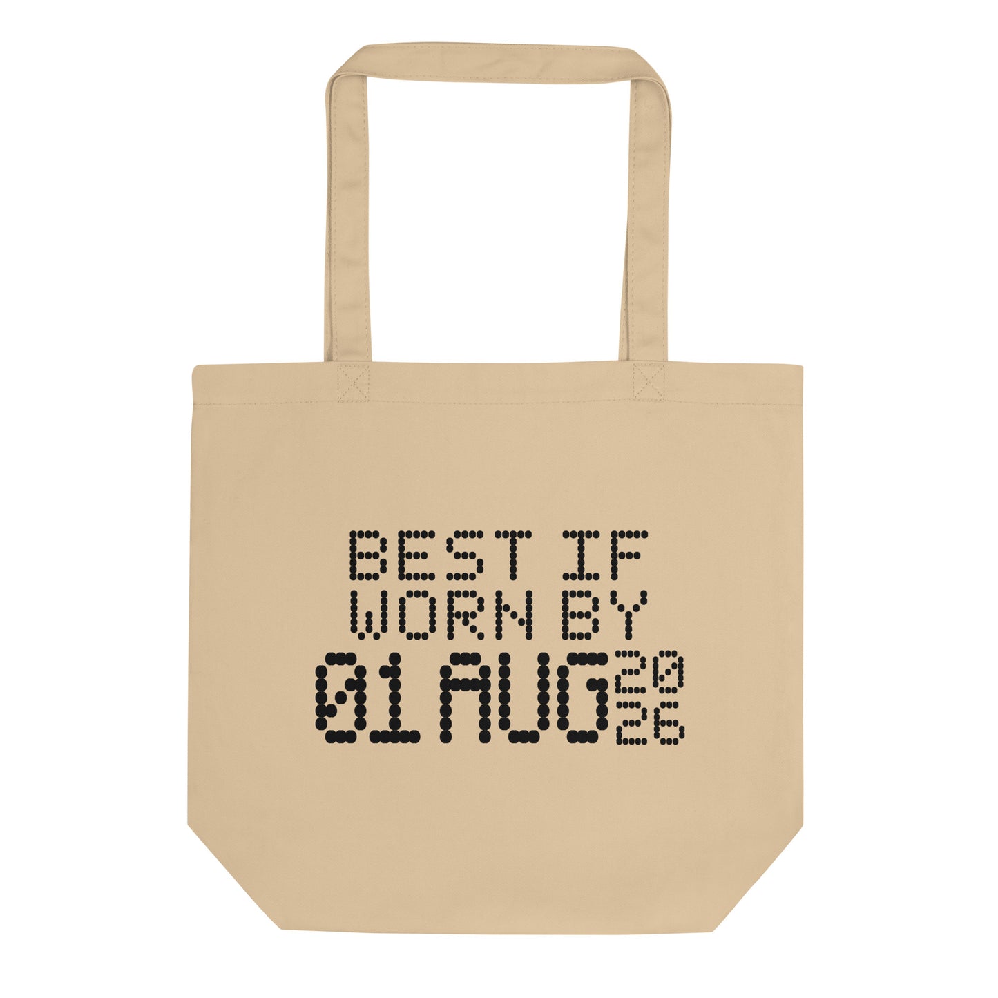 A minimalistic eco tote bag with the phrase “Best If Worn By 01 August 2026” printed in a bold, dot-matrix-style font. The design resembles an expiration date label, blending humor with clean, modern aesthetics.