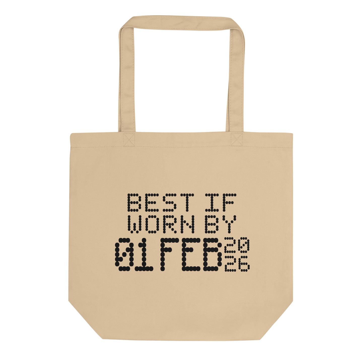 A minimalistic eco tote bag with the phrase “Best If Worn By 01 February 2026” printed in a bold, dot-matrix-style font. The design resembles an expiration date label, blending humor with clean, modern aesthetics.