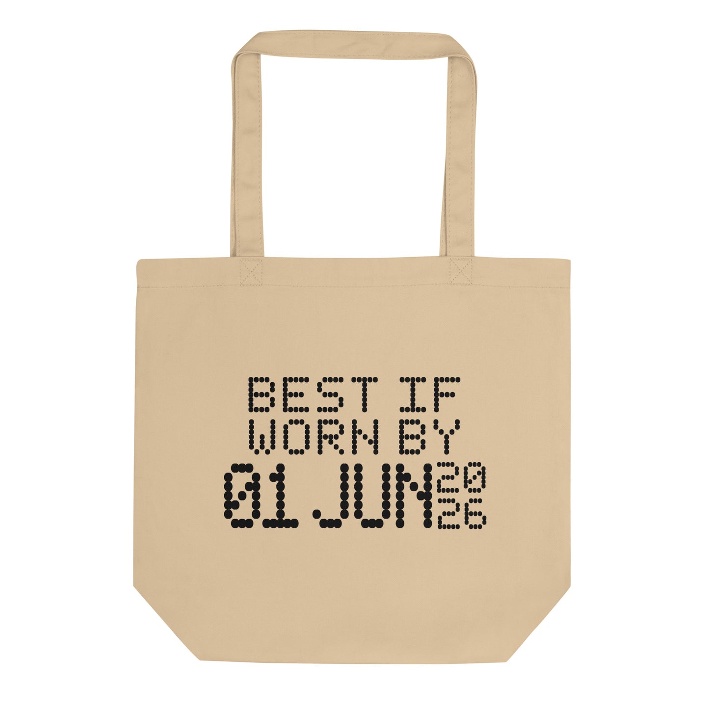A minimalistic eco tote bag with the phrase “Best If Worn By 01 June 2026” printed in a bold, dot-matrix-style font. The design resembles an expiration date label, blending humor with clean, modern aesthetics.