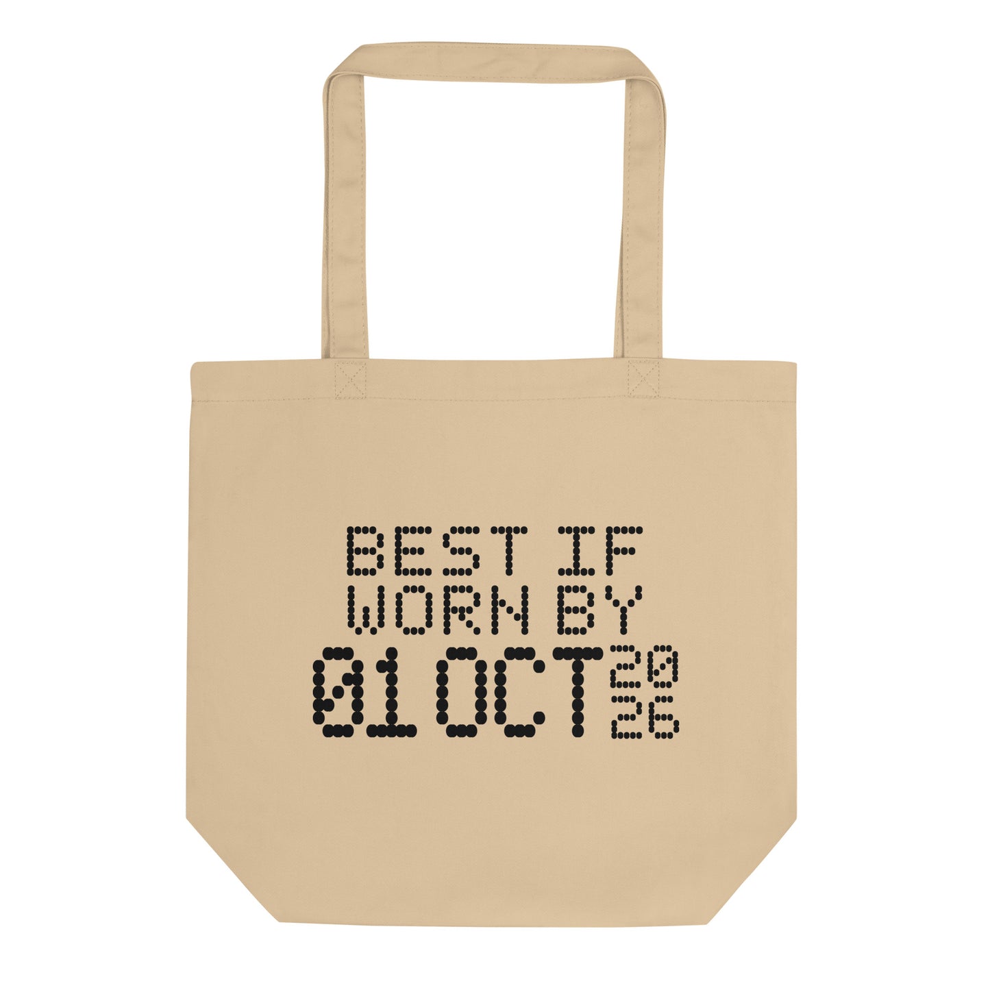 A minimalistic eco tote bag with the phrase “Best If Worn By 01 October 2026” printed in a bold, dot-matrix-style font. The design resembles an expiration date label, blending humor with clean, modern aesthetics.