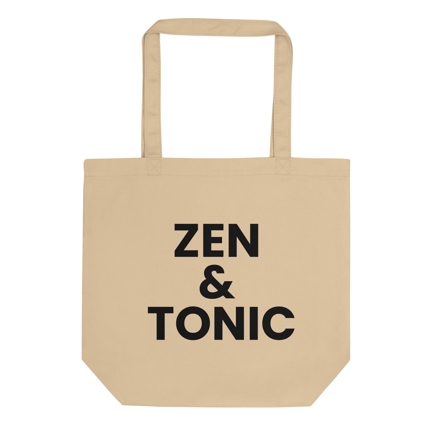 A light beige tote bag with the phrase "ZEN & TONIC" printed on the front. The text is in a bold, black, sans-serif font and is stacked on three lines.