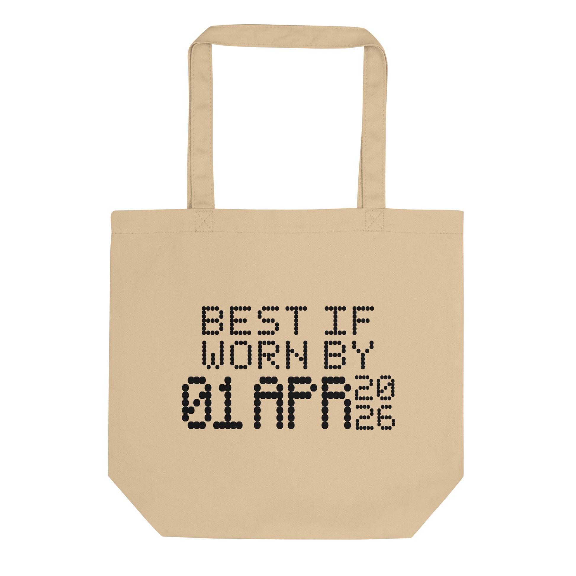 A minimalistic eco tote bag with the phrase “Best If Worn By 01 April 2026” printed in a bold, dot-matrix-style font. The design resembles an expiration date label, blending humor with clean, modern aesthetics.
