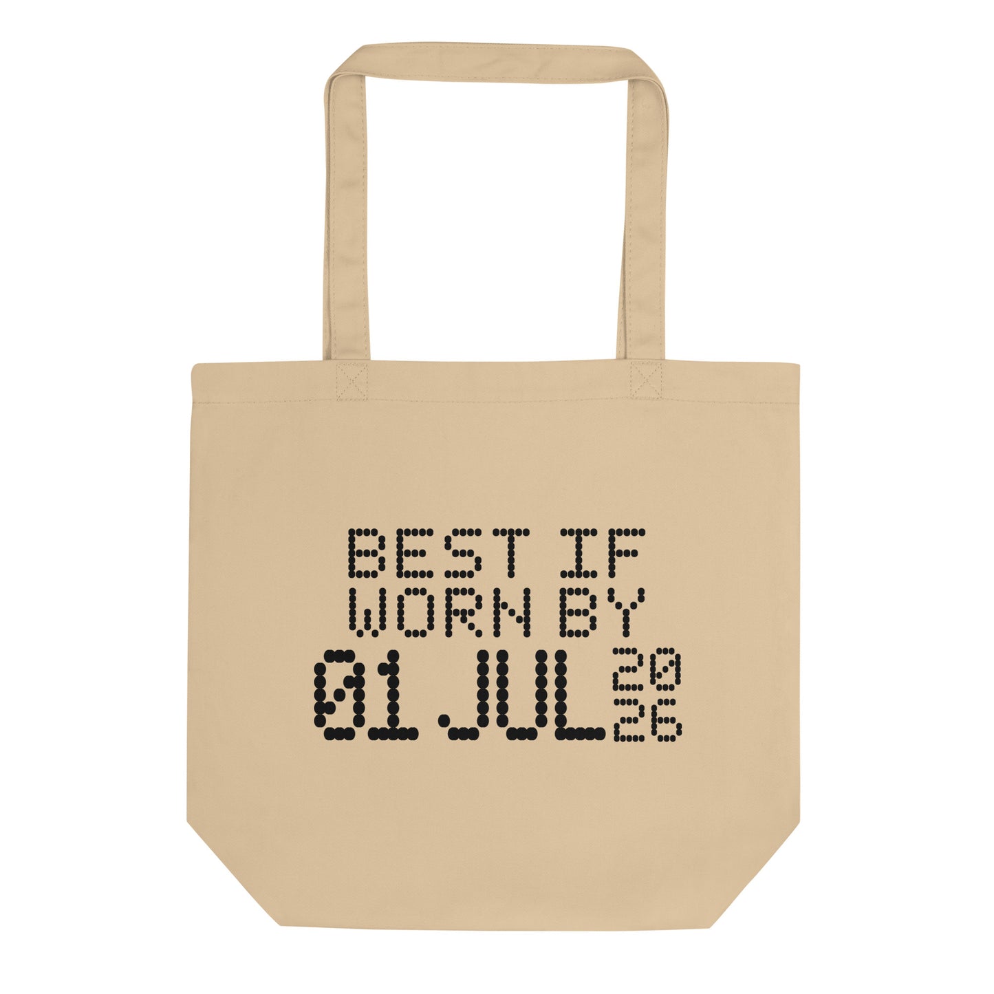 A minimalistic eco tote bag with the phrase “Best If Worn By 01 July 2026” printed in a bold, dot-matrix-style font. The design resembles an expiration date label, blending humor with clean, modern aesthetics.