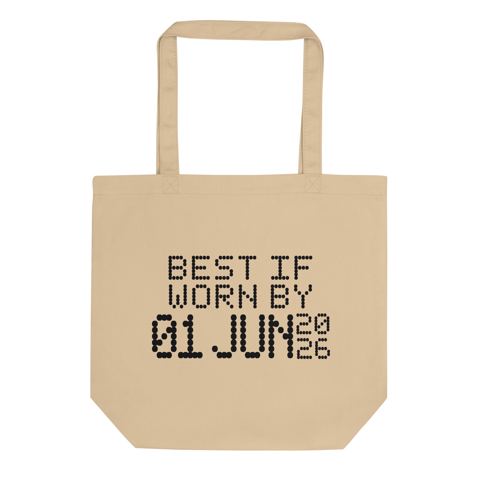 A minimalistic eco tote bag with the phrase “Best If Worn By 01 June 2026” printed in a bold, dot-matrix-style font. The design resembles an expiration date label, blending humor with clean, modern aesthetics.