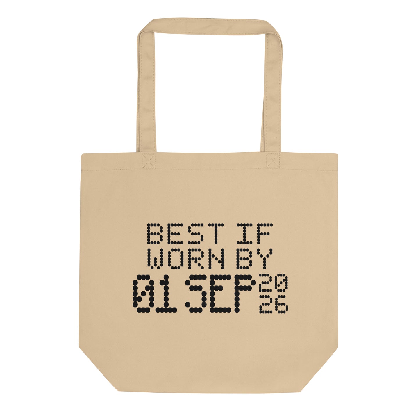 A minimalistic eco tote bag with the phrase “Best If Worn By 01 September 2026” printed in a bold, dot-matrix-style font. The design resembles an expiration date label, blending humor with clean, modern aesthetics.