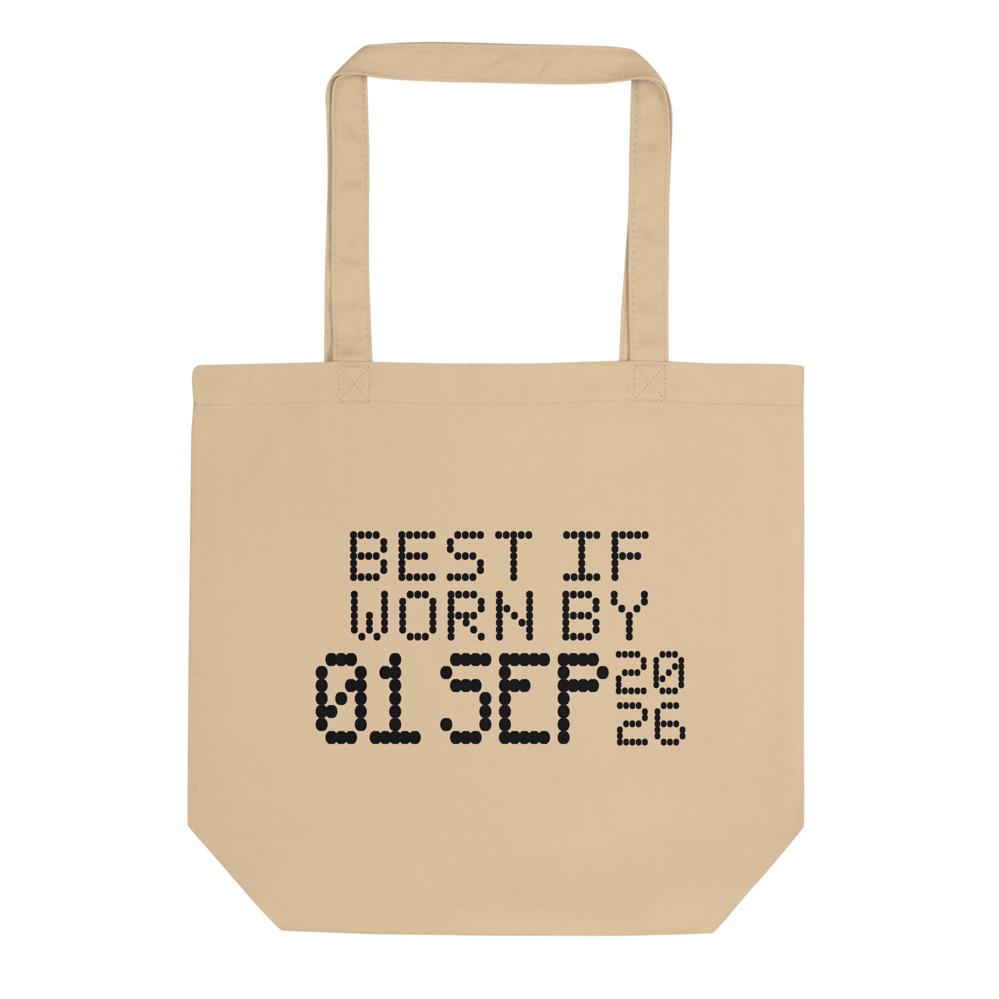 A minimalistic eco tote bag with the phrase “Best If Worn By 01 September 2026” printed in a bold, dot-matrix-style font. The design resembles an expiration date label, blending humor with clean, modern aesthetics.