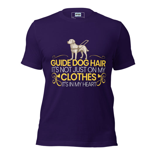 “GUIDE DOG HAIR IT’S NOT JUST ON MY CLOTHES IT’S IN MY HEART” Bold yellow highlights key words (“GUIDE DOG HAIR,” “CLOTHES,” “HEART”), while delicate white text and whimsical golden flourishes add emotional warmth. The layout balances clarity with sentiment, making it a heartfelt tribute to guide dogs and their deep bond with humans.