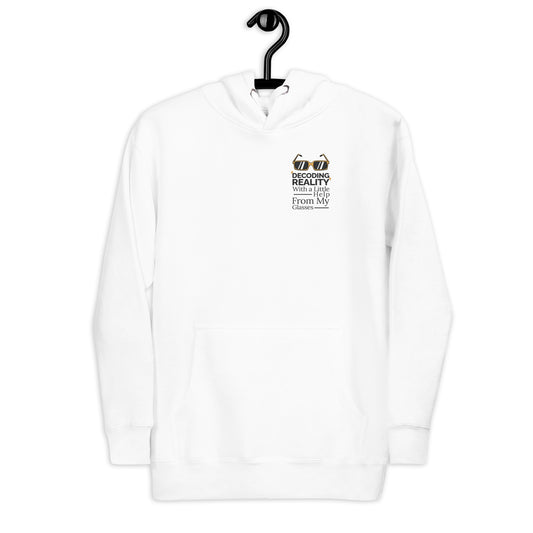 A stylized pair of gold-framed smart glasses appears above the layered phrase “DECODING REALITY With a Little Help From My Glasses,” using a mix of bold and classic serif fonts. Reflective stripes on the lenses and horizontal lines framing the text emphasize clarity, support, and the empowering role of assistive tech.