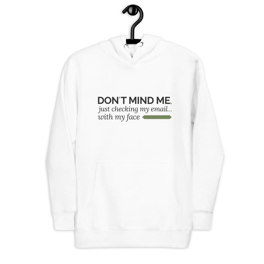 A sleek typographic layout delivers dry wit in three lines:
“DON’T MIND ME,” set in bold, modern black caps — centered and confident.
Beneath it, a softer script reads: “just checking my email...” fading into italics and ellipsis.
The final line closes with: “with my face” in the same muted serif, followed by a minimalist olive-green rectangle — a visual punchline.
Minimal color, maximum intent. A low-voice declaration of seamless tech woven into everyday being.