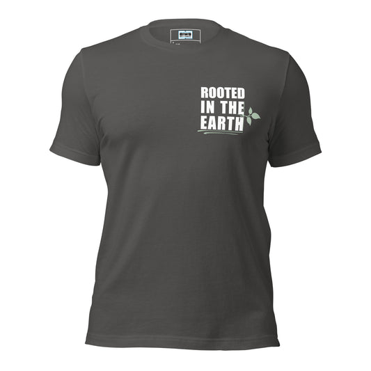 The bold white phrase "ROOTED IN THE EARTH" is stacked in three centered lines, using an all-caps heavy font. A light green vine with leaves wraps subtly around the right side of the text, while two green brushstroke lines underscore the design, symbolizing stability, growth, and a deep connection with nature.