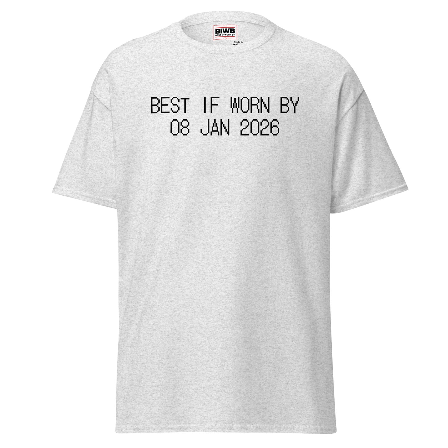 “BEST IF WORN BY 08 JAN 2026” printed in black dot matrix font mirrors an expiration code—hinting at how quickly the first week of the year has already slipped by.