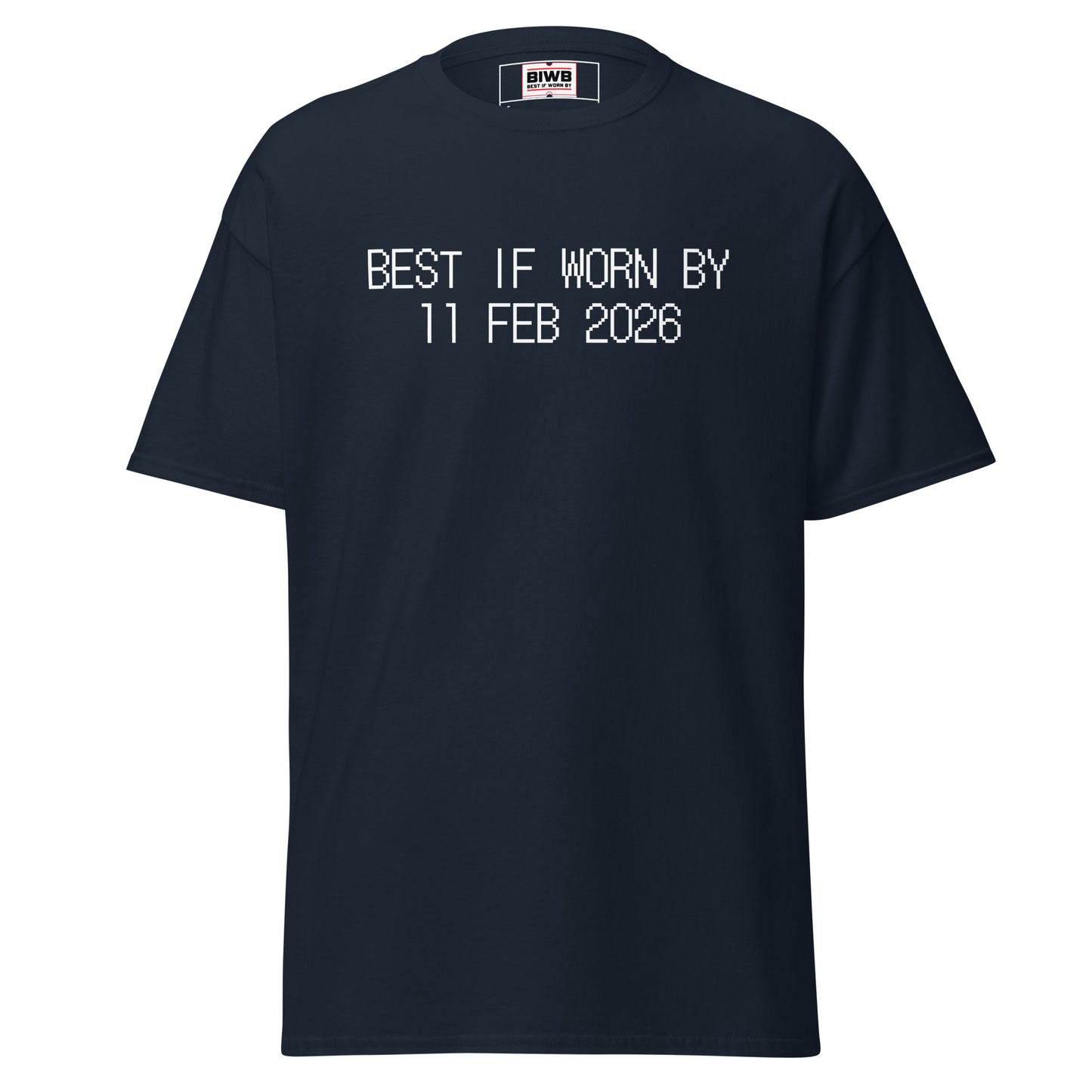 “BEST IF WORN BY 11 FEB 2026” printed in black dot matrix font mirrors expiry marks—making even an uneventful Wednesday feel like it has a shelf life.