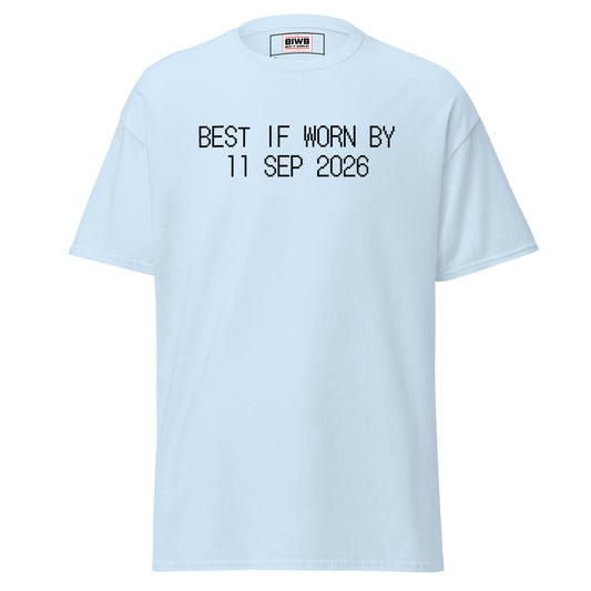 “BEST IF WORN BY 11 SEP 2026” printed in black dot matrix font—a day of remembrance in the U.S., loss etched deeper than ink.