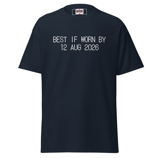 “BEST IF WORN BY 12 AUG 2026” printed in black dot matrix font—the year’s clock ticks louder, calendars dissolving.