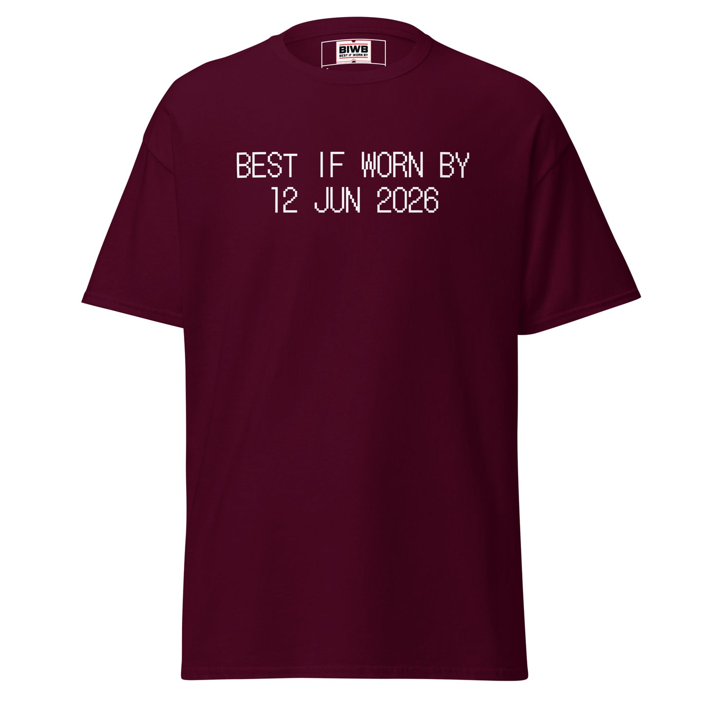 “BEST IF WORN BY 12 JUN 2026” printed in black dot matrix font—Friday pressed into permanence, though it too fades by midnight.
