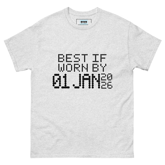 The phrase “BEST IF WORN BY 01 JAN 2026” appears in a black dot matrix font, styled like an expiration label. The minimalist typeface adds a touch of quiet humor and mindfulness about time and presence.