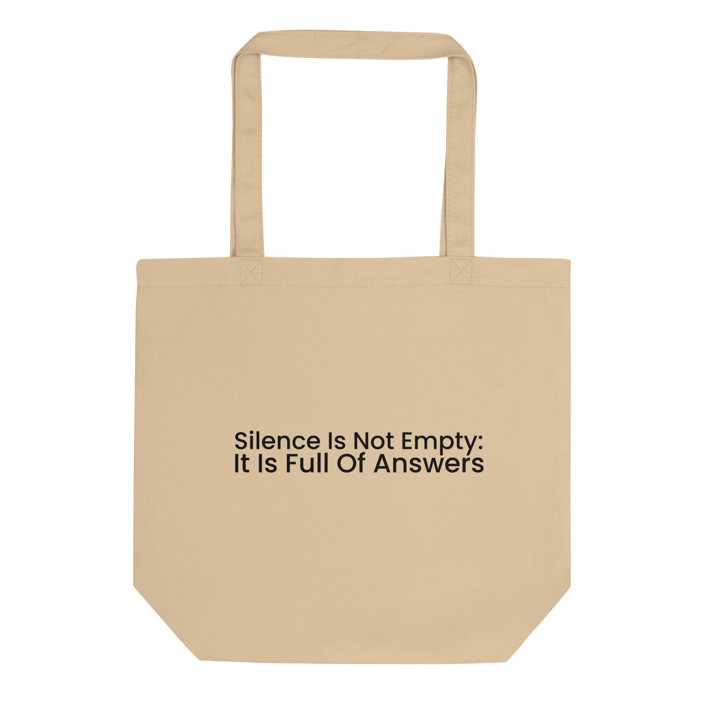 A light beige tote bag with the phrase "Silence Is Not Empty: It Is Full Of Answers" printed on the front. The text is in a black sans-serif font and is stacked on two lines.