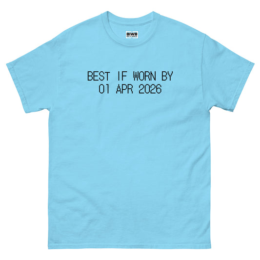 Printed in a black dot matrix font, “BEST IF WORN BY 01 APR 2026” imitates a product expiration stamp—balancing playful with calm introspection on the passage of time.